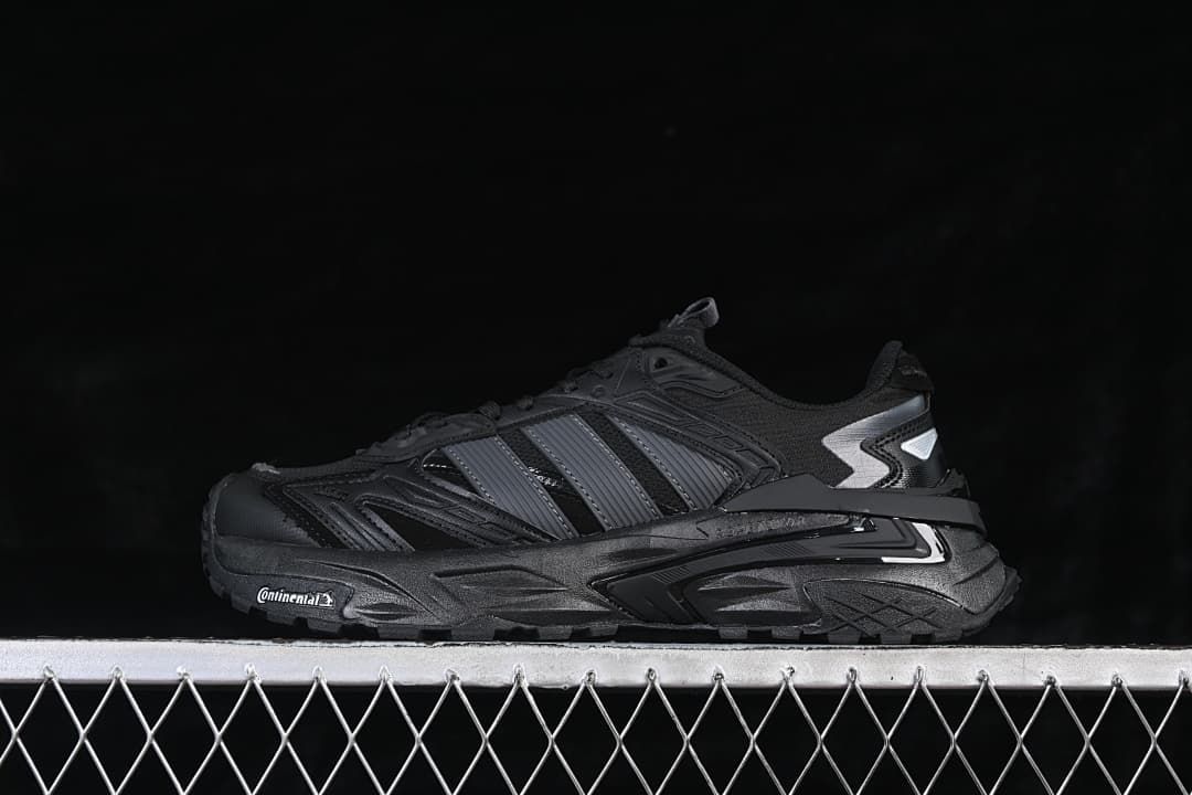 Side view of the black adidas XLG Storm Edge sneaker
