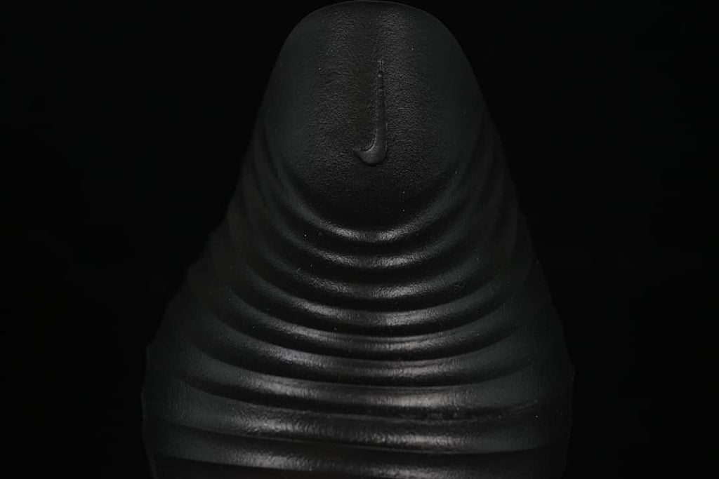 Rear view showing the ridged heel and small logo