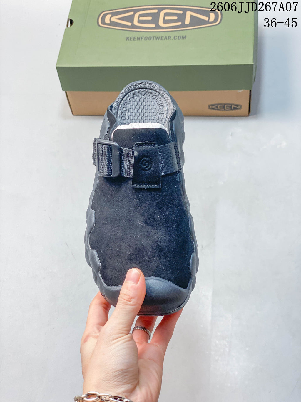 Top view of the sandal showing its closed toe and adjustable strap.