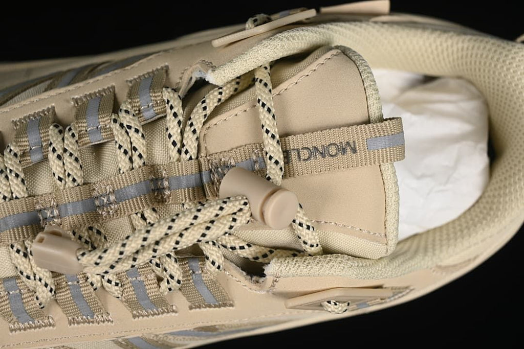 Close-up of the laces, lace loops and tongue pull tab.