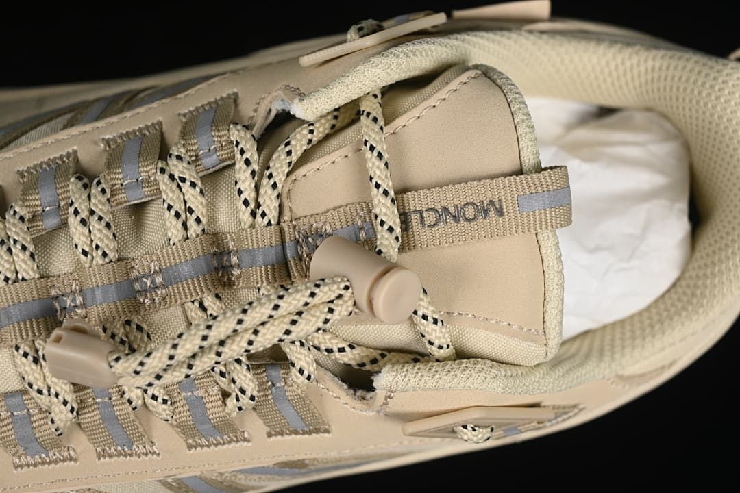 Close-up of the laces, lace loops and tongue pull tab.