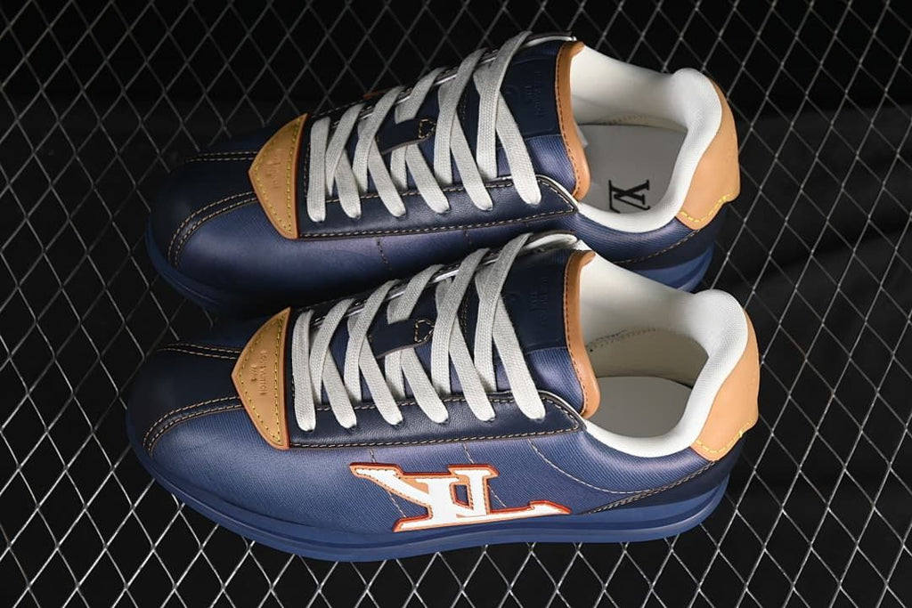 Pair of dark blue low-top sneakers shown from above