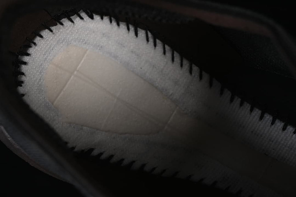 Close-up of the shoe interior lining and footbed.