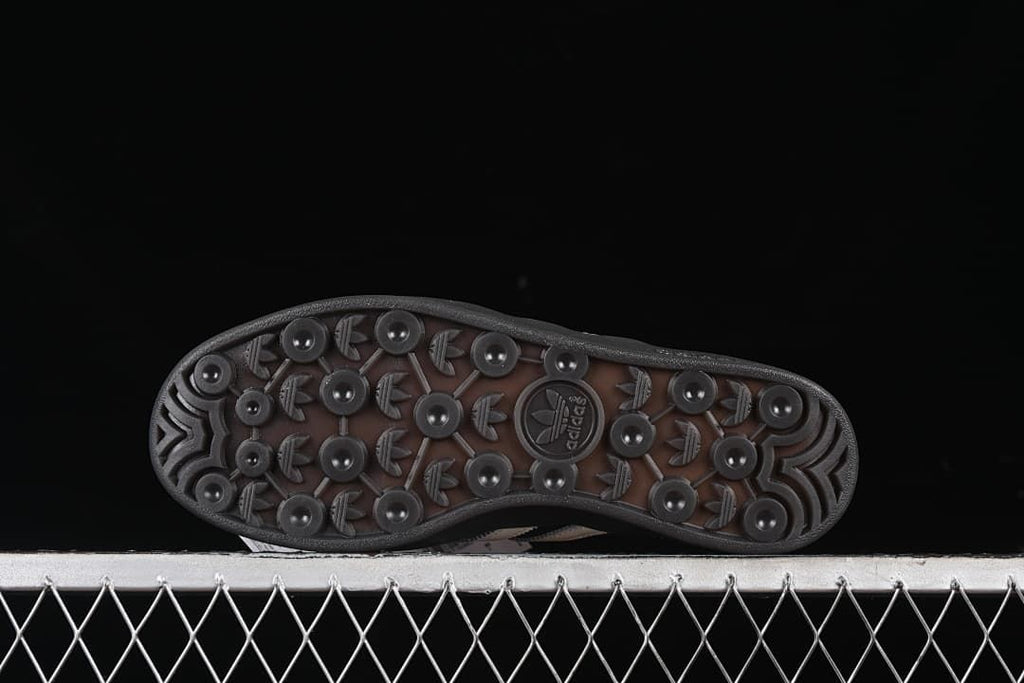Underside view showing the patterned rubber outsole
