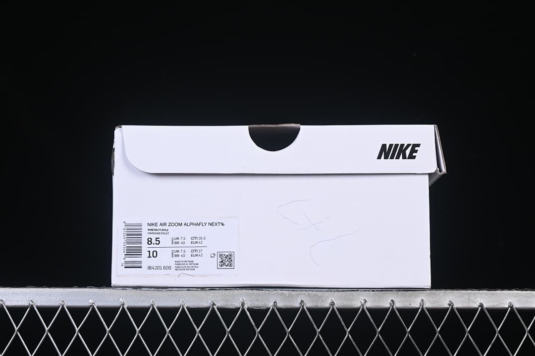 Nike shoe box label showing the Alphafly Next% model name and sample size markings