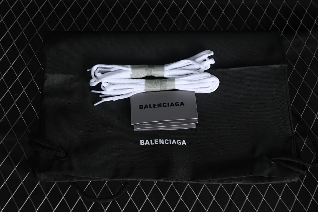 Black branded shoe bag and two sets of white shoelaces
