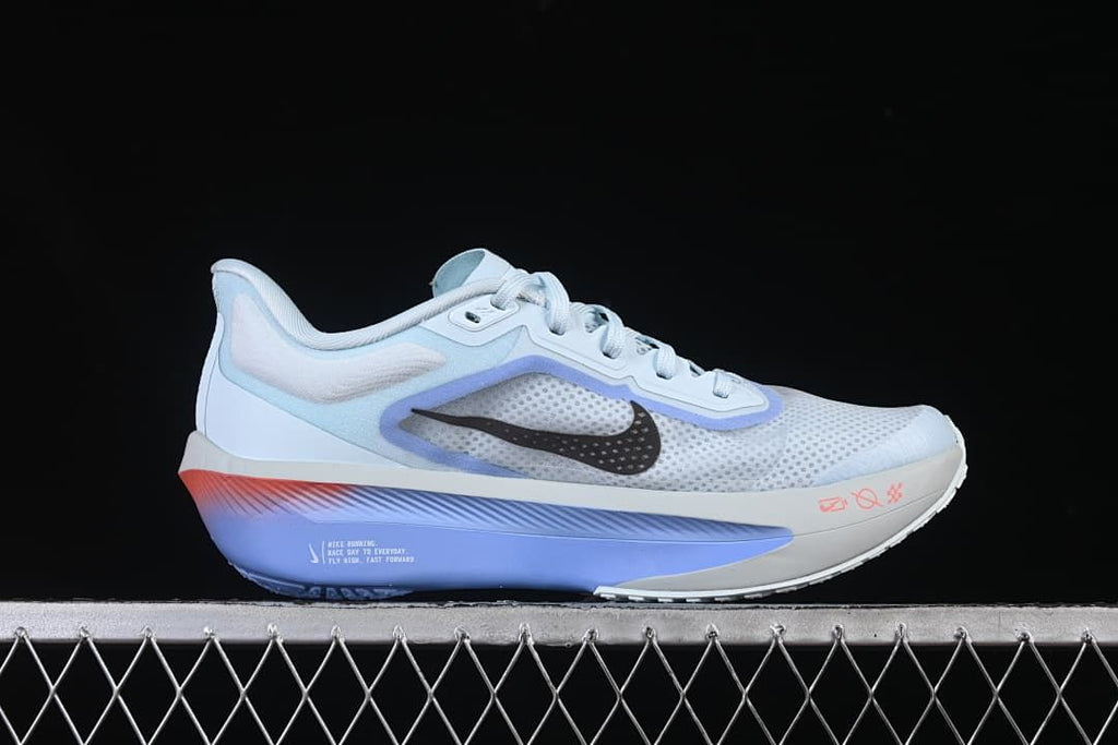 Outer side profile of the running shoe with black Swoosh and violet sole.