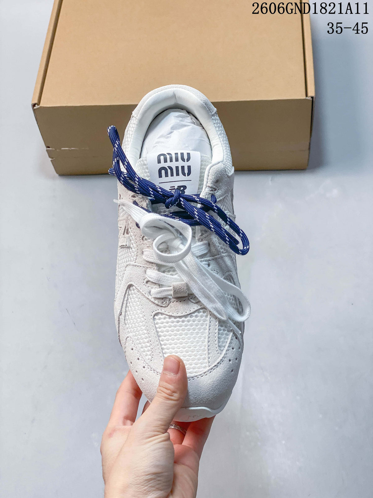 Top-down view showing the mesh upper, tongue branding, and two lace colors