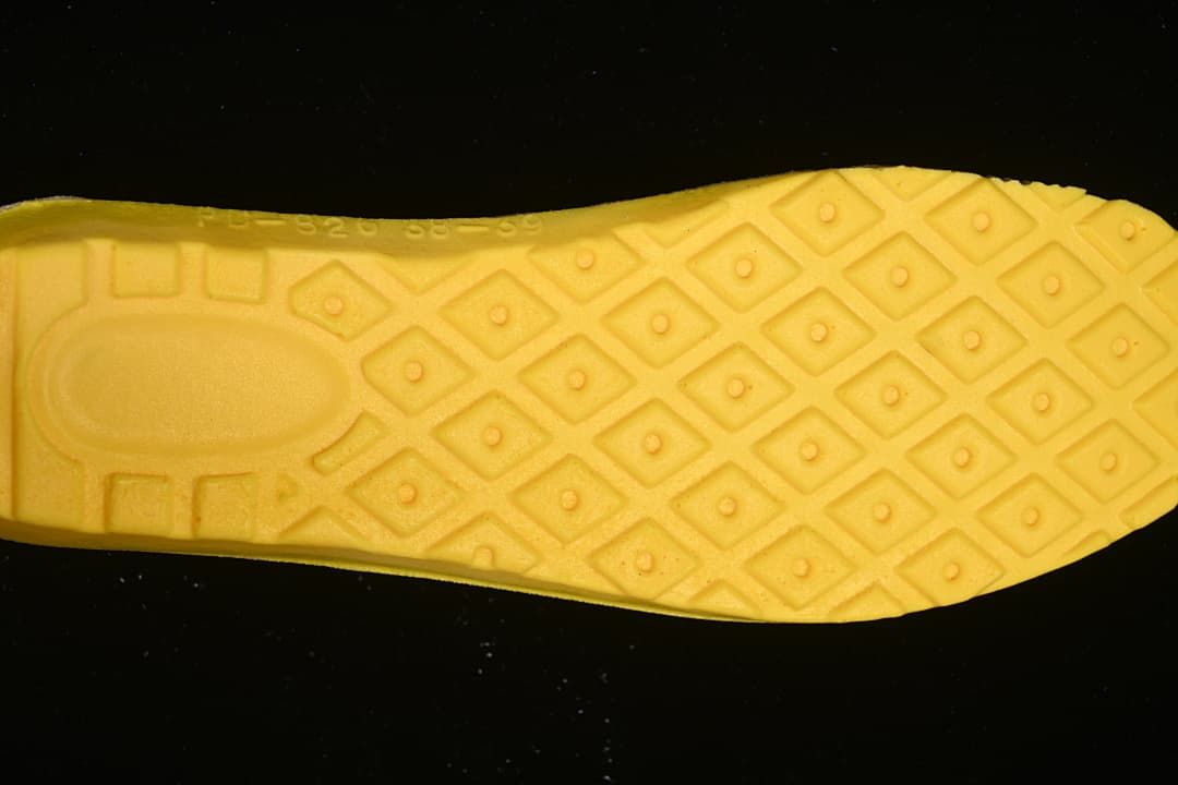 Close-up of the boot's yellow-colored outsole tread