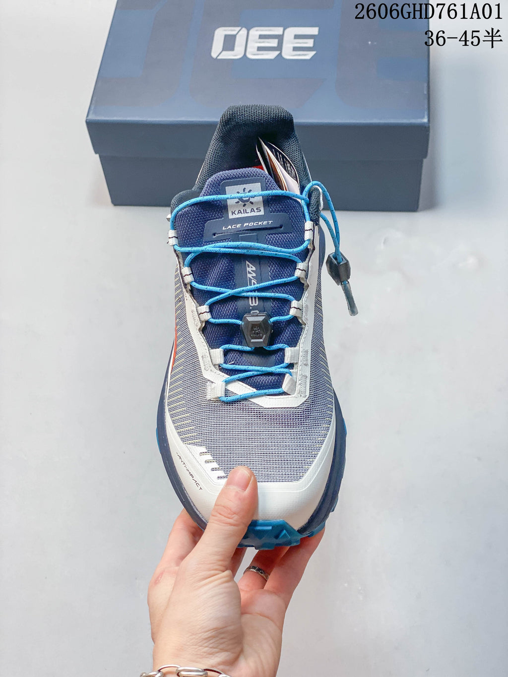 Front view highlighting the blue quick-lace system and lace pocket on a Kailas FUGA EX330 II shoe.