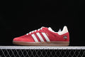 Side profile of a red adidas Samba OG Tal sneaker with off-white stripes and a gum-colored outsole.