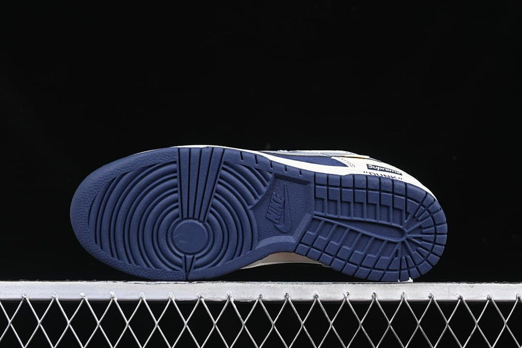 Underside view showing the navy outsole tread.