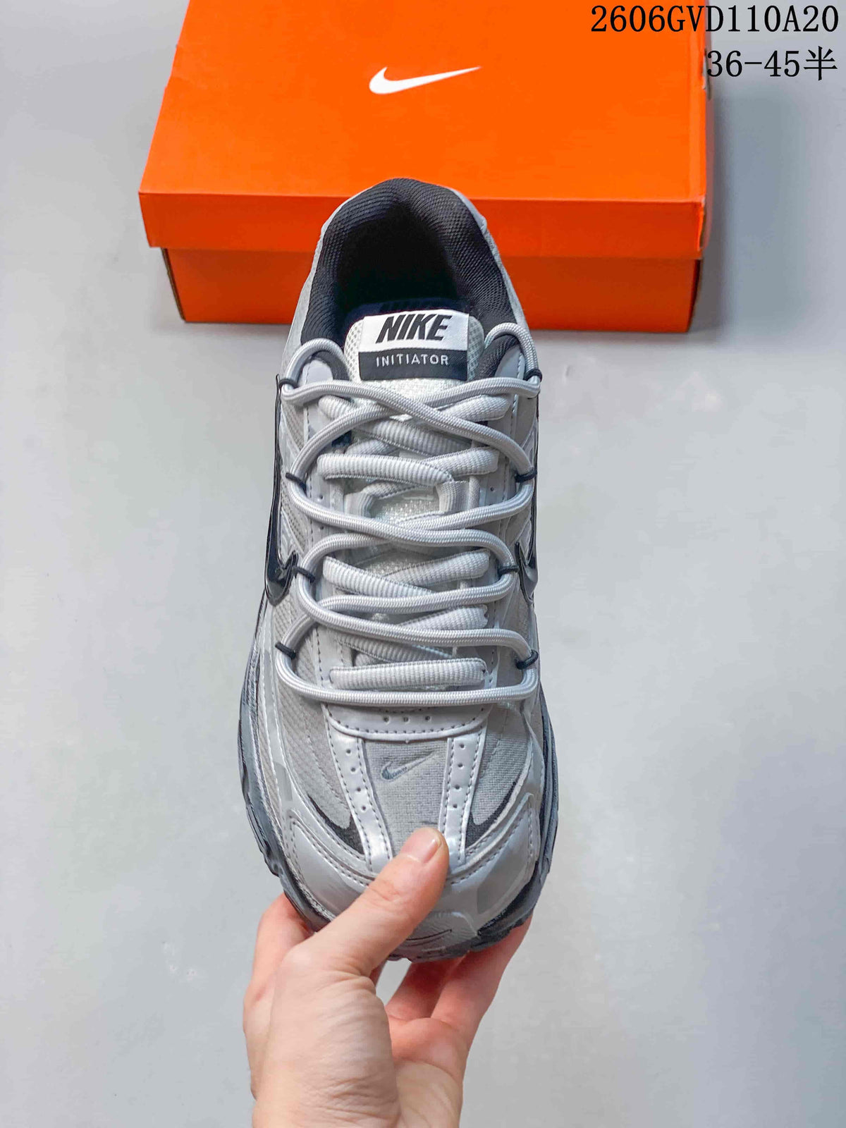 Top view of the sneaker showing the laces, tongue label, and panel details.