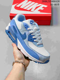 Blue and white Nike Air Max 90 sneaker with a visible heel Air unit