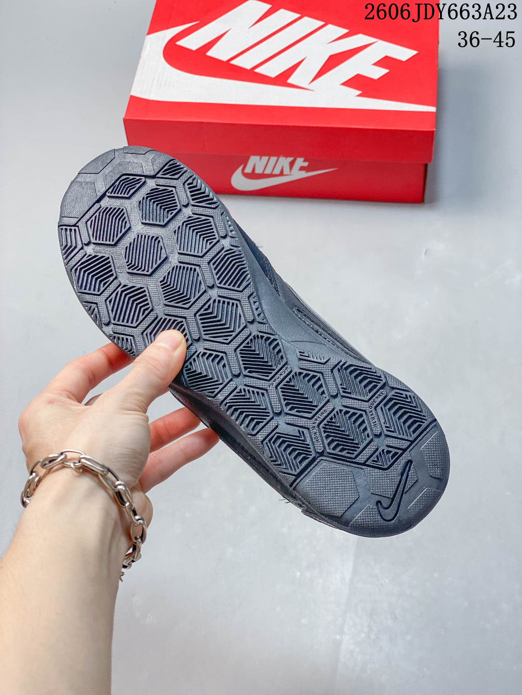 Close-up of the patterned outsole on a Nike Gato sneaker