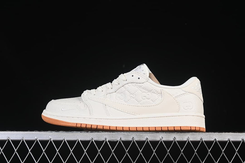 Side view of an off-white low-top sneaker with embossed side detailing and a gum-colored outsole