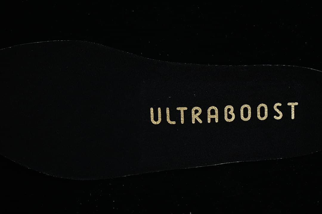 Close-up of the black insole with Ultraboost lettering.