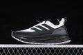 Side view of white and black Adidas Ultraboost 5 Climawarm running shoe