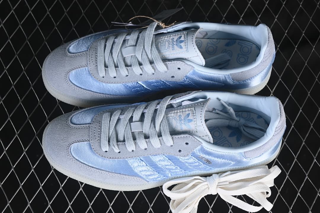 Pair of pale blue and gray Samba OG sneakers shown from above