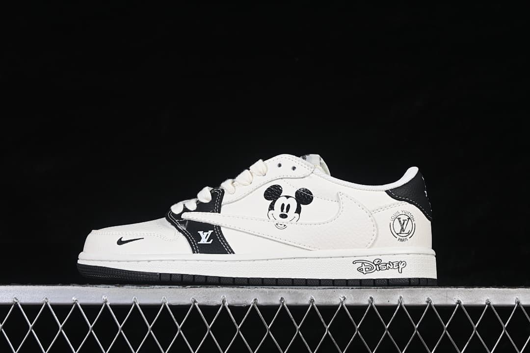 Side view of a white and black low-top sneaker with Mickey Mouse graphics and character details on the midsole.