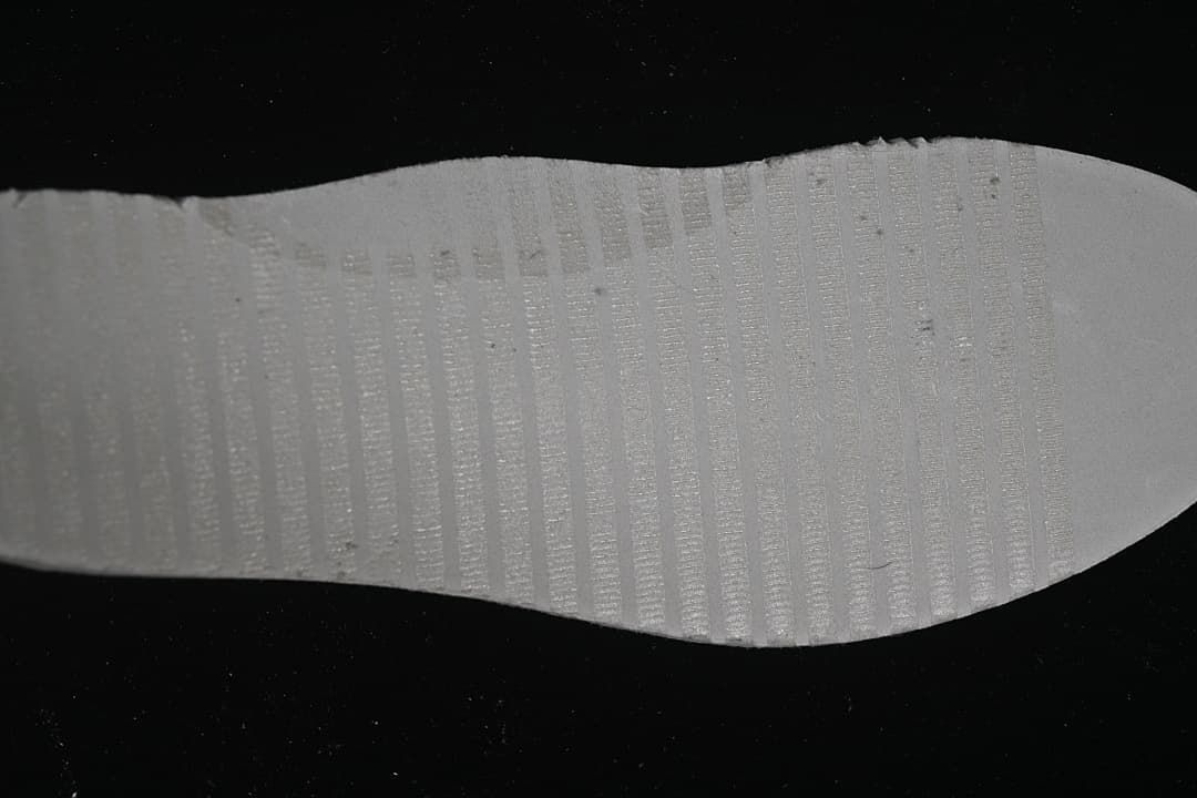 Close-up of the pale textured outsole
