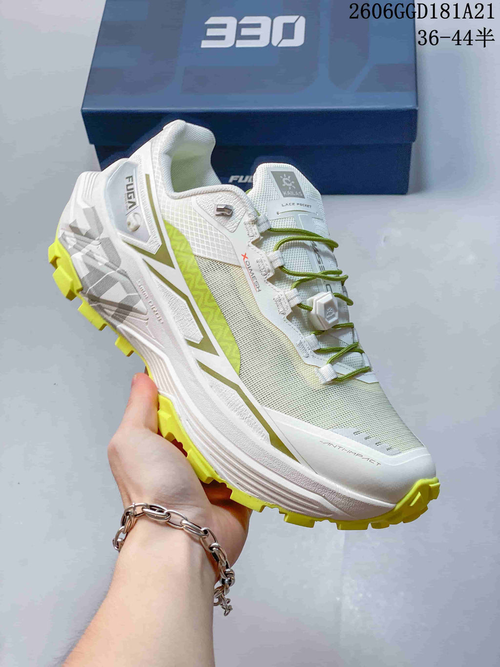 Side view of a white Kailas FUGA EX BOA trail-running shoe with green details and lime outsole