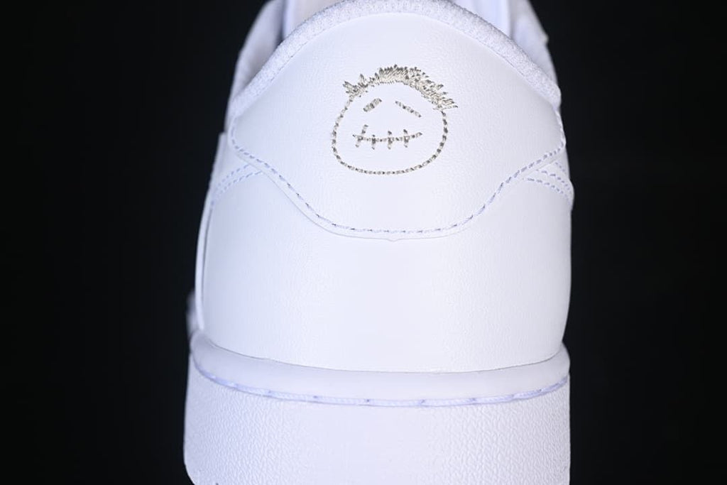 Rear view showing a small graphic on the white heel
