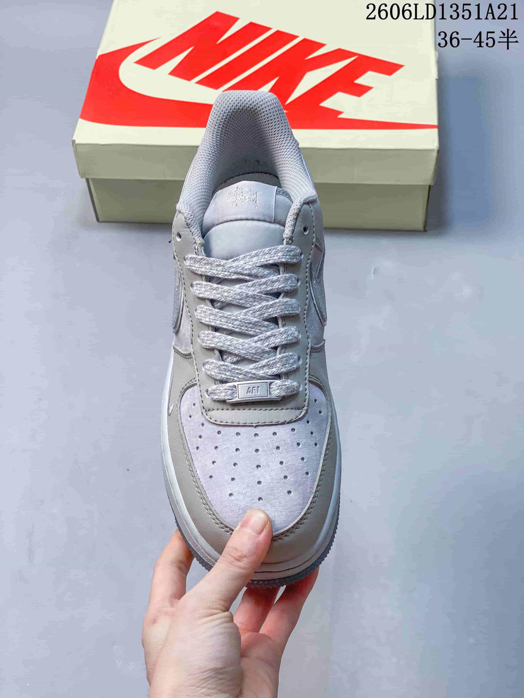 Top view showing the perforated toe, gray laces, and tongue