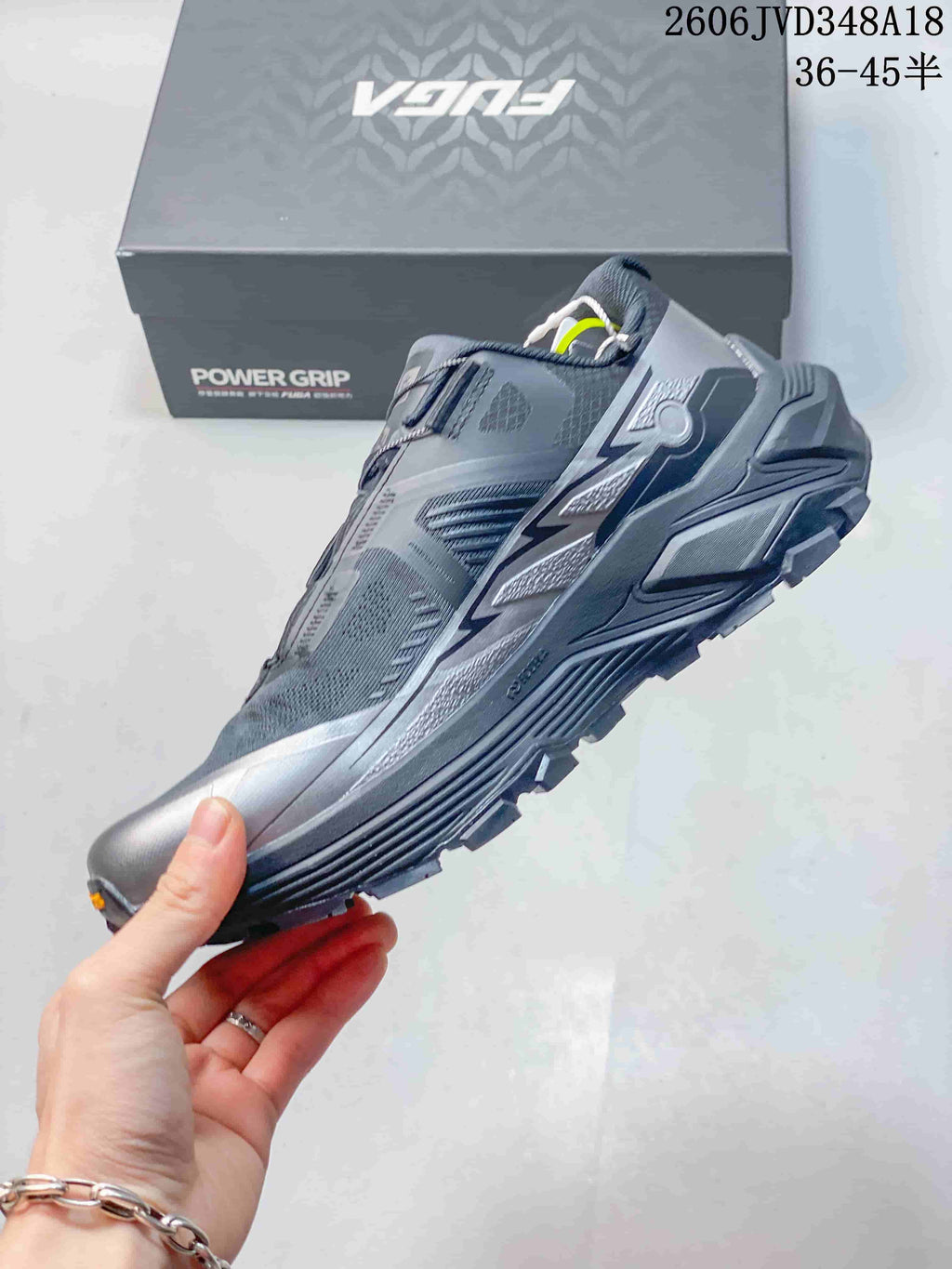 Side profile of the gray KAILAS FUGA EX3 shoe with a dial closure.