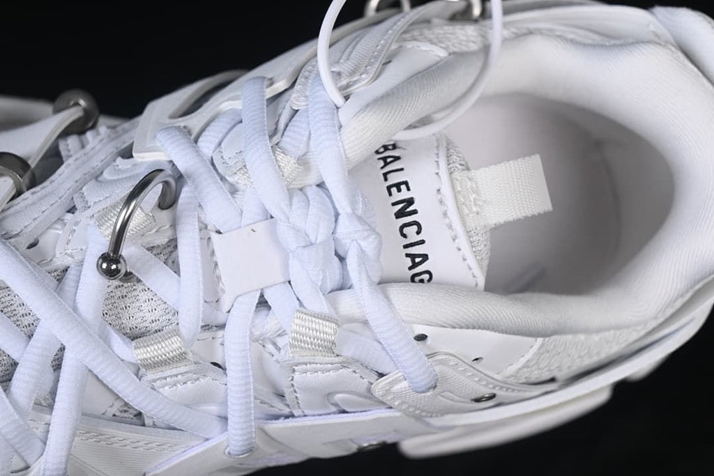 Top close-up of laces and tongue branding