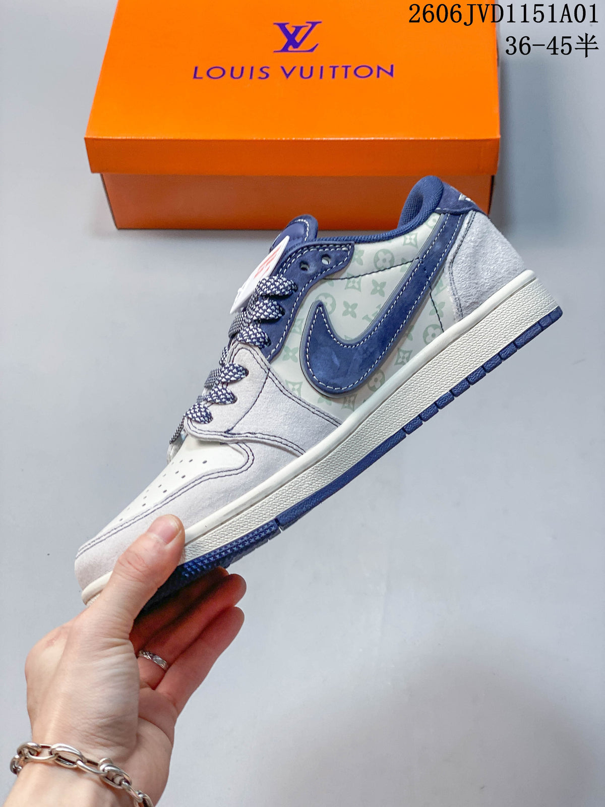 Side view of the sneaker with blue overlays and pale patterned panels