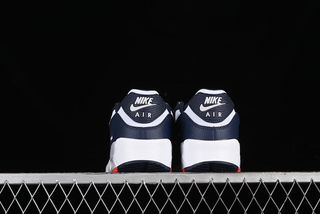Rear view of the sneakers showing heel branding