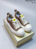 Pair of taupe and brown Fendi Match low-top sneakers with white laces and thick white soles
