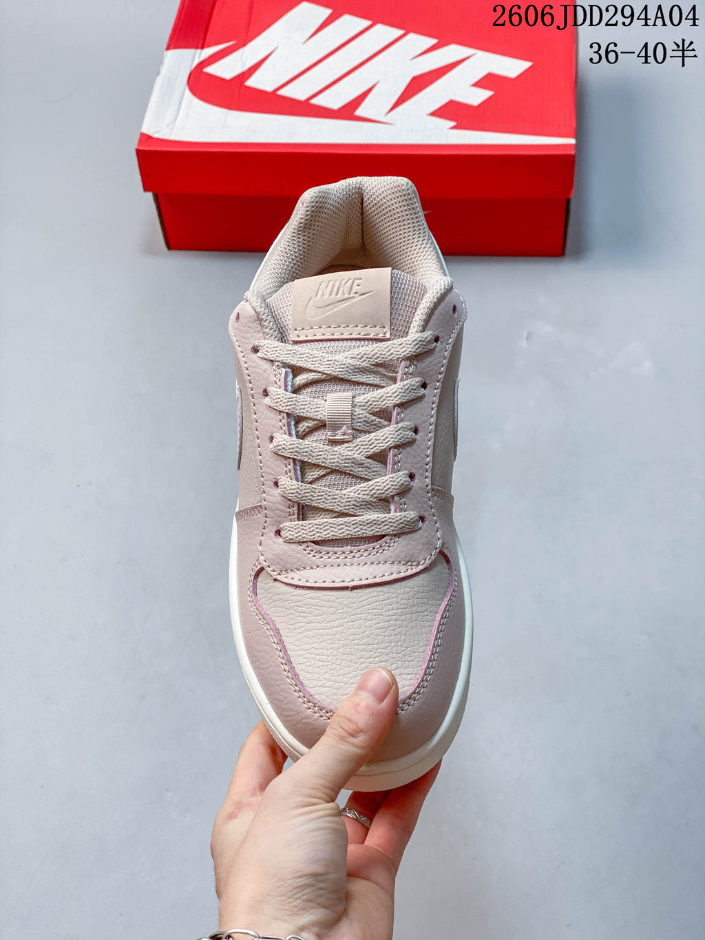Front view showing the laces, tongue and color-blocked toe.