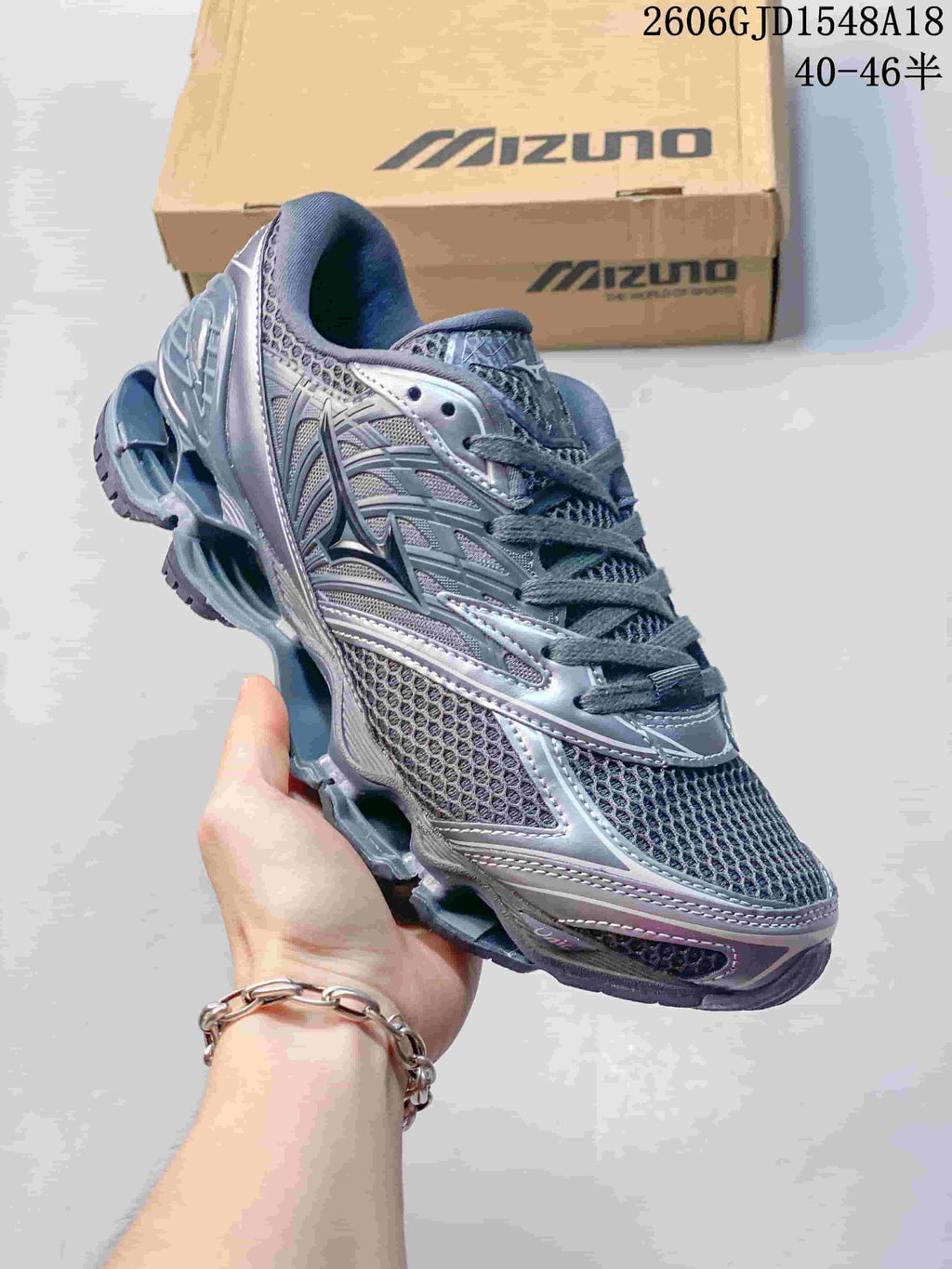 Angled side view of a metallic gray Mizuno Prophecy 8 mesh running shoe