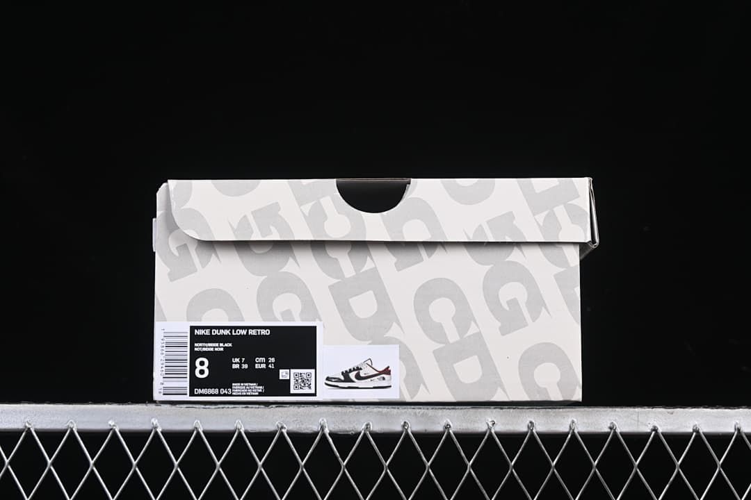 Shoe box label showing Nike Dunk Low Retro and style code DM6868-043
