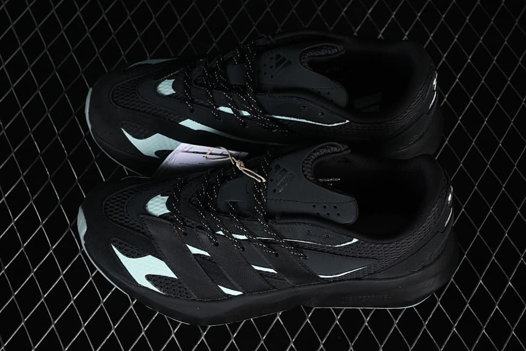 Pair of black Adidas Lightblaze shoes viewed from above