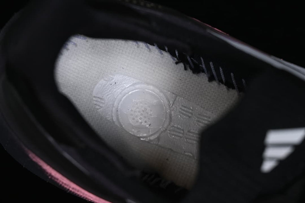 Close-up view inside the shoe showing the insole and part of the white side stripes.