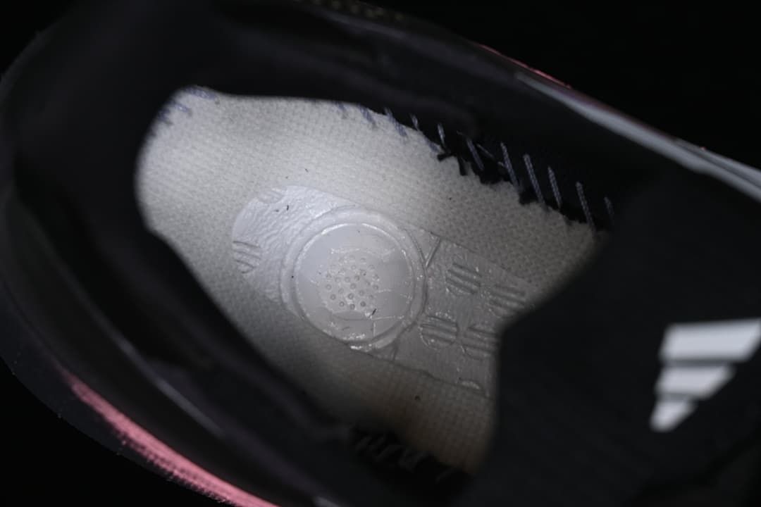 Close-up view inside the shoe showing the insole and part of the white side stripes.
