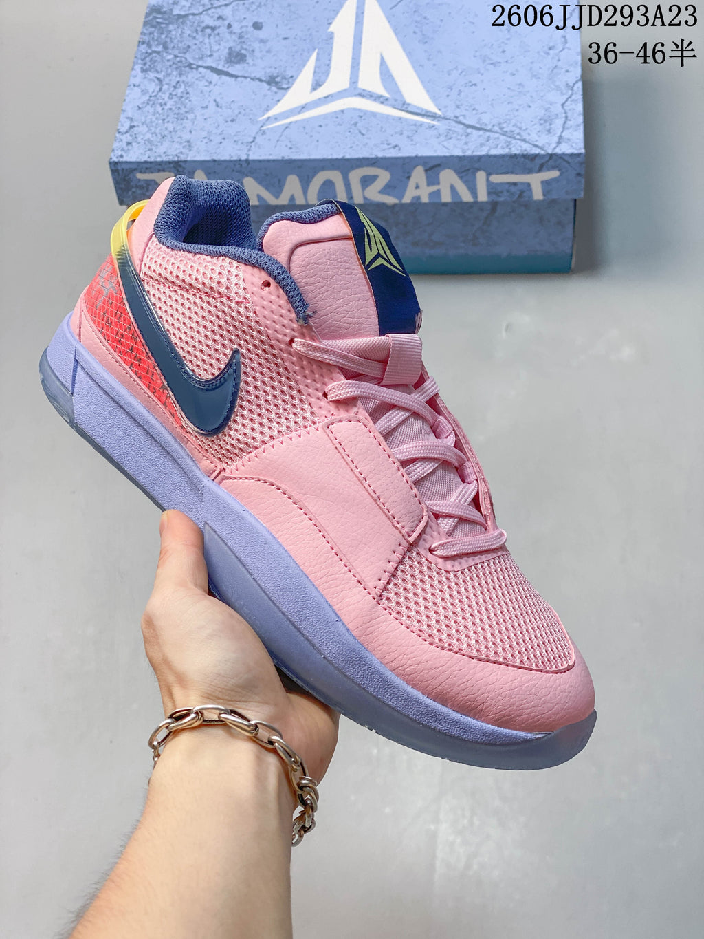 Pink Nike Ja 1 EP shoe with navy logo and pale purple midsole.