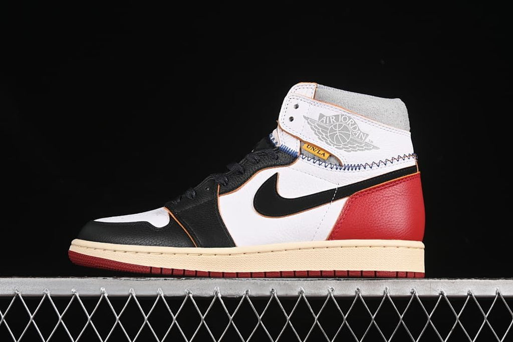 Side profile of the high-top sneaker against a dark background
