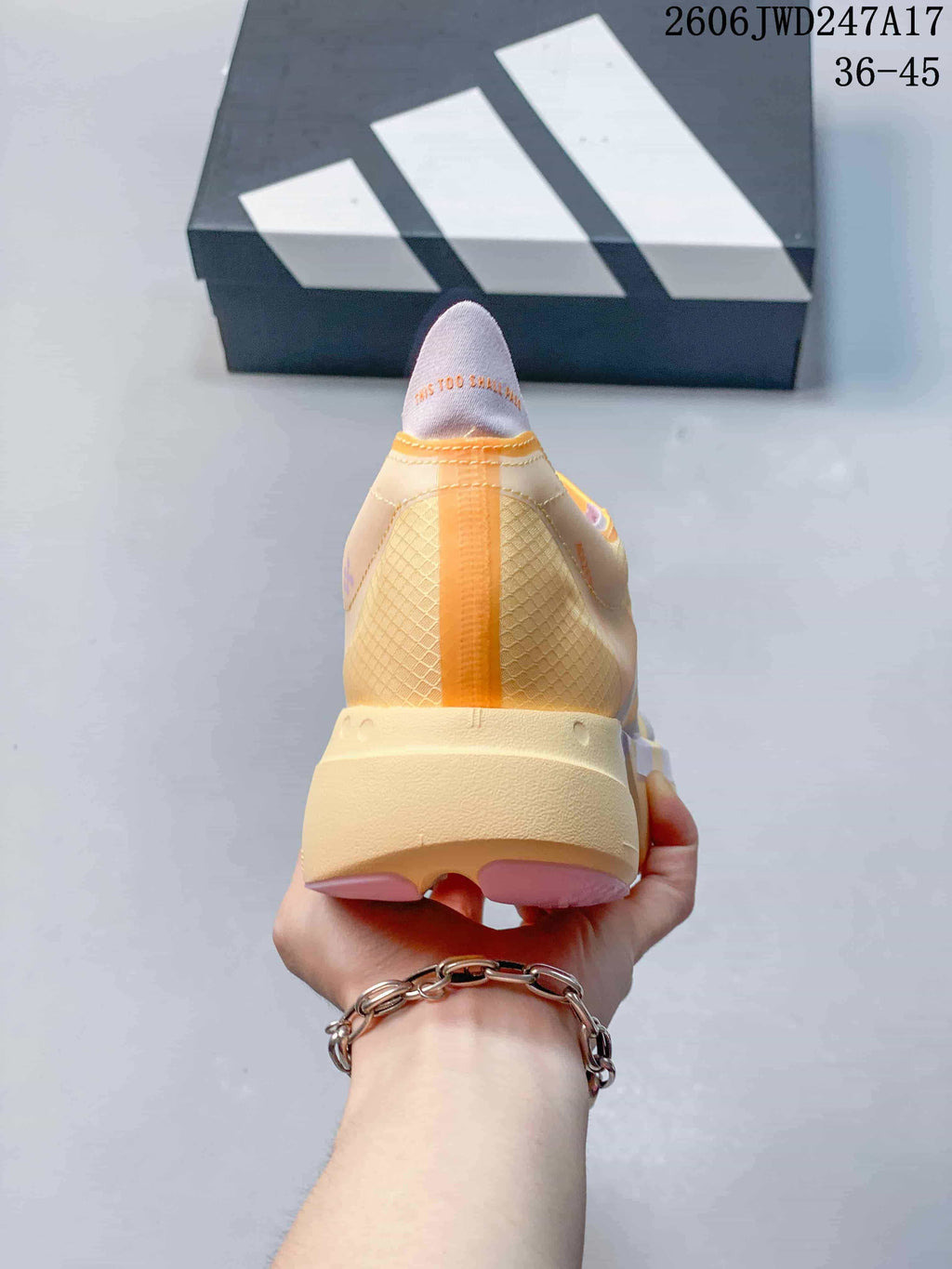 Rear view showing the shoe's heel and sculpted sole.