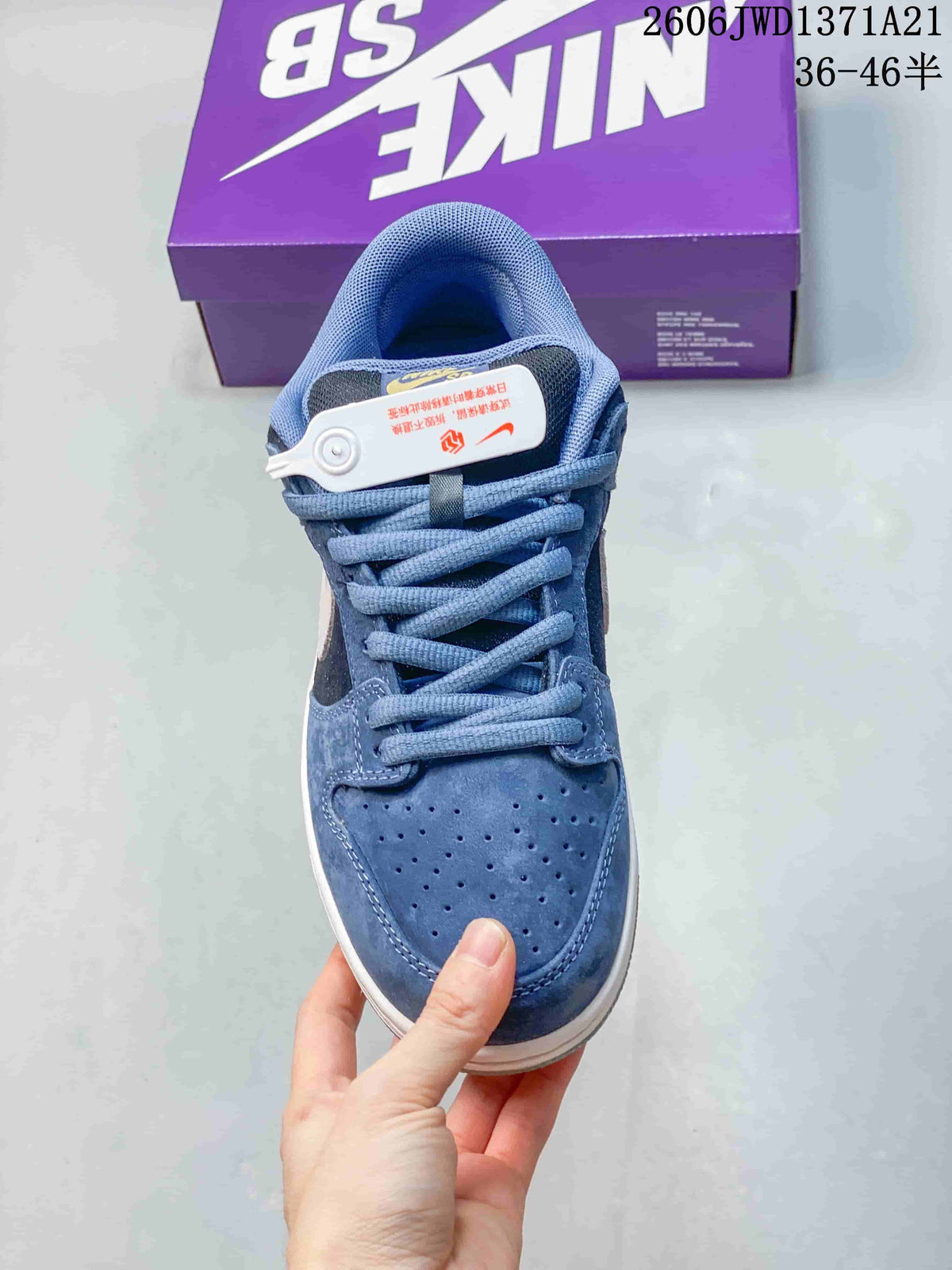 Top view of a blue Nike SB Dunk Low Pro sneaker showing the laces and perforated toe.