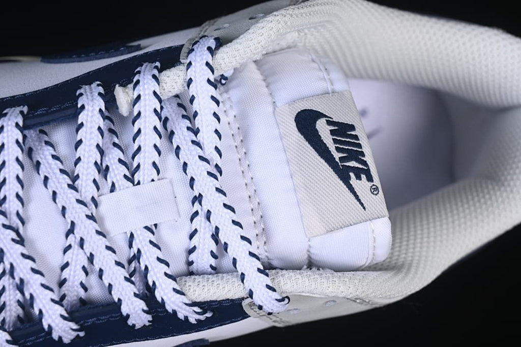Top-down detail of the tongue, collar, and contrast laces