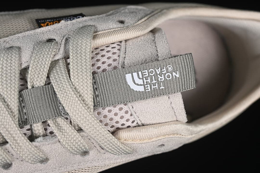 Close-up of the laces, tongue pull tab, and collar