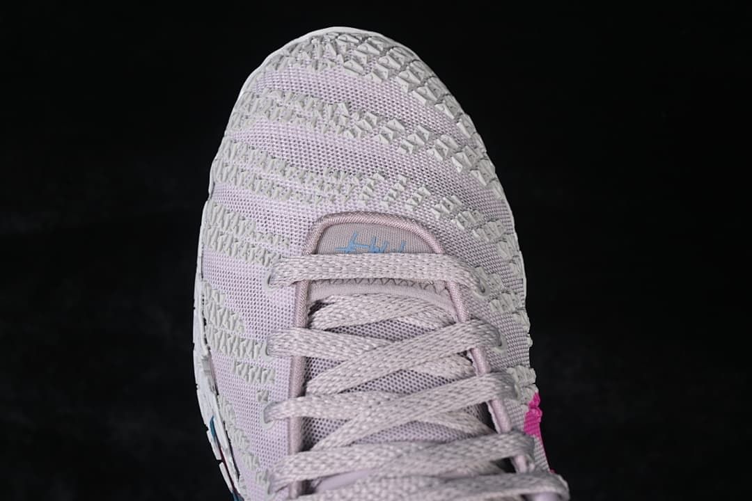 Top-down view of the textured toe and lace-up front