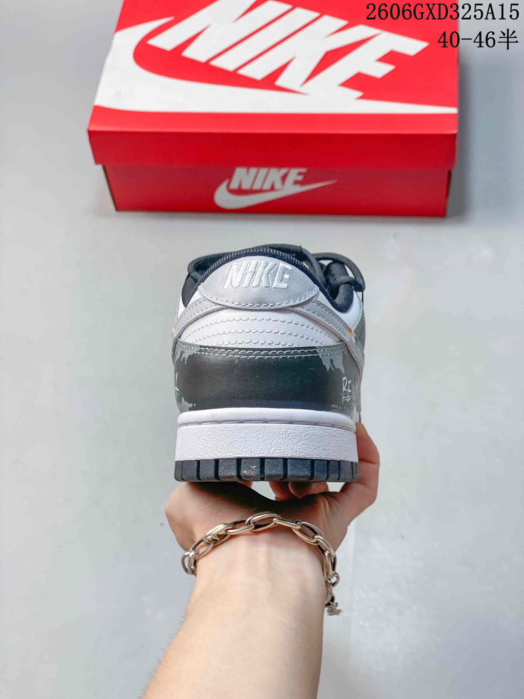 Rear view showing the white heel tab and gray graphic heel panel