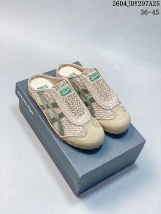Pair of beige and green Onitsuka Tiger Mexico 66 Sabot sneakers displayed on the shoebox.