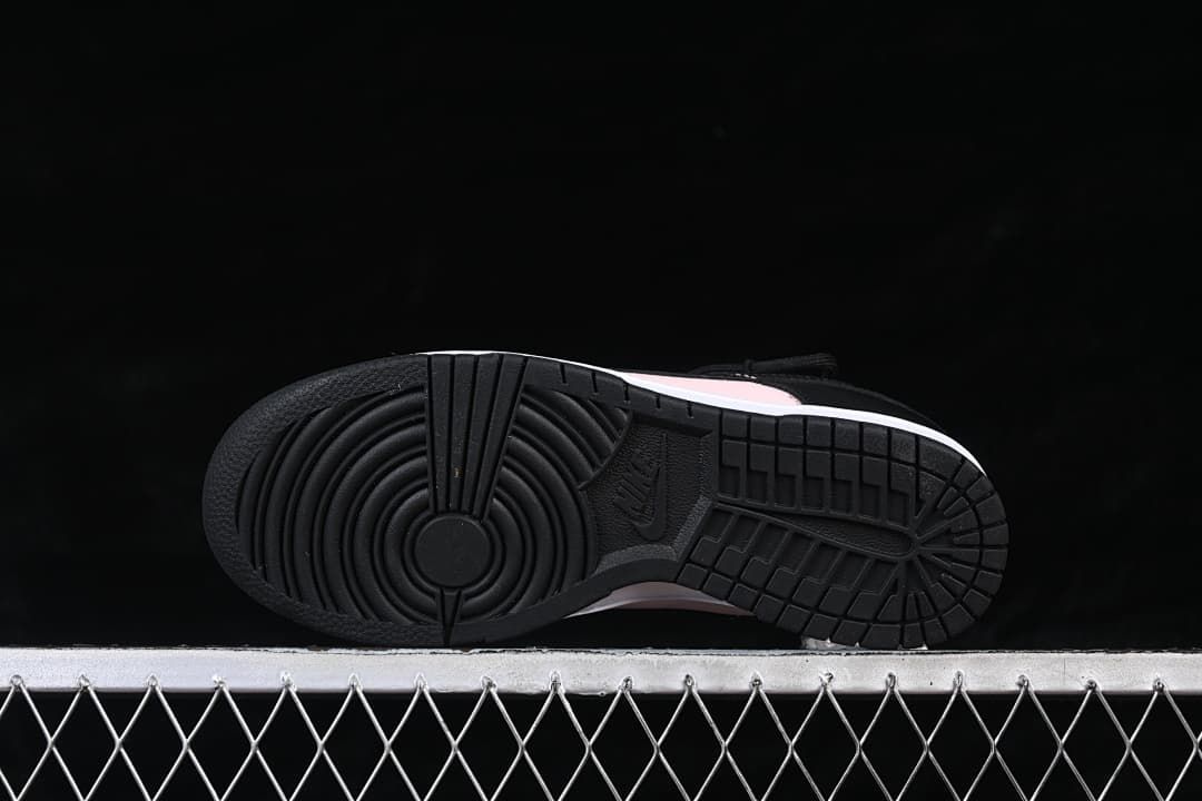 Underside view showing the black patterned outsole