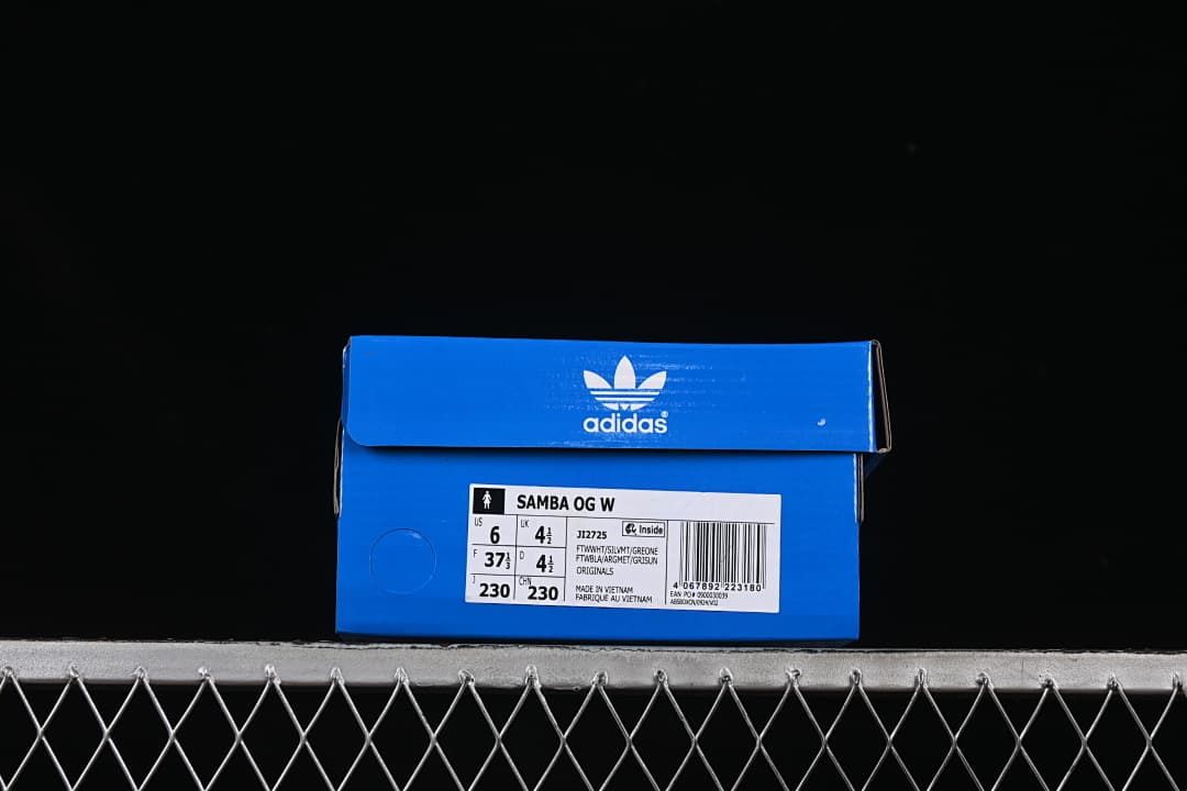 Blue adidas shoe box with a visible Samba OG W label and sample size information